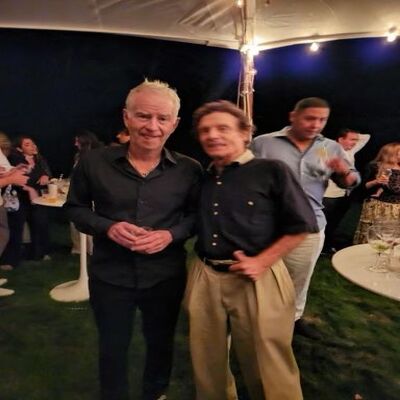Marshall J. Hubsher in conversation with tennis legend John McEnroe after the Pro-Am tournament