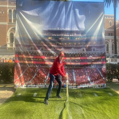 Marshall J. Hubsher participating in USC's 50-Yard Line Sword Tradition, a significant moment before the football game